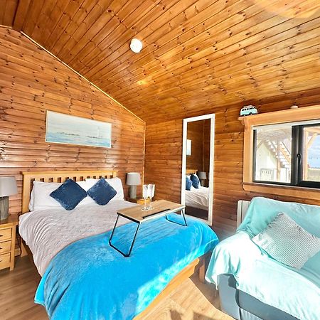 Cosy Portmor Log Cabin- Sea Views, Deck & Relaxation Malin Head المظهر الخارجي الصورة